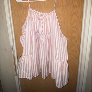 Women’s pink and white stripe top with cold shoulder. Size L